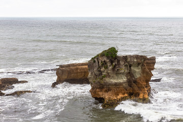 Fototapeta na wymiar Seascape of Paparoa. Pancake Rocks. Paparoa national park, South Island, New Zealand