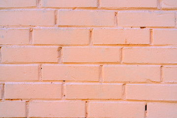 Brick wall texture. Brick wall painted with pink paint.