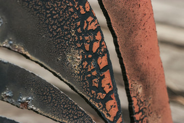Fototapeta premium Texture: old sheet of metal is covered with cracks and rust. Macro photo of natural phenomena.