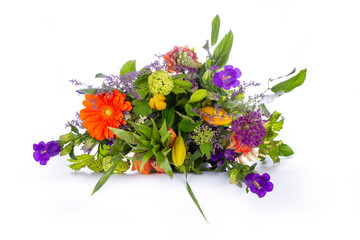 Lying down Colorful bouquet of mixed flowers in a vase, isolated on a white background