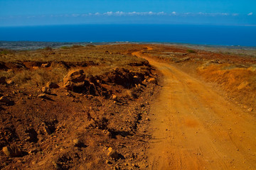 Red Volcanic Dirt to Polihua Beach  on the Polihua Trail With Molokai Across the Kalohi Channel, Lanai,Hawaii, USA