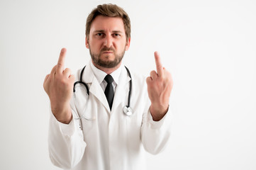 Male doctor with stethoscope in medical uniform showing double fuck you