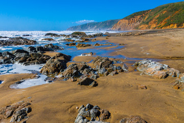 Rock Covered McClures Beach With Tomales Point in The Distance, Point Reyes National Sea Shore, California, USA