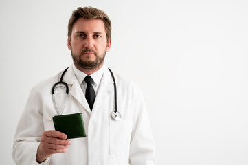 Male doctor with stethoscope in medical uniform showing his wallet