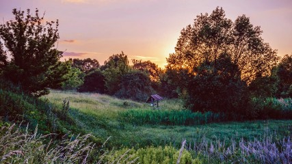 Obraz na płótnie Canvas sunset in the village nature