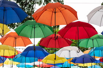 Fototapeta na wymiar Colorful umbrellas hung for decorative purposes