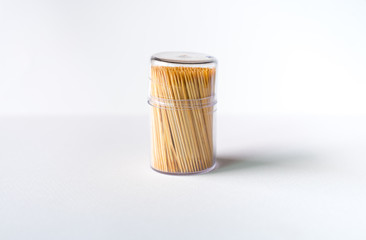 A toothpick on the white scene