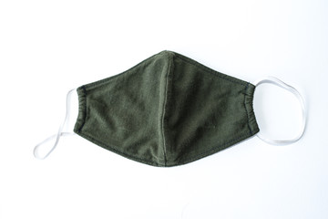 A black cloth mask in a white scene