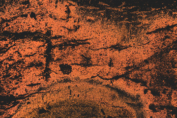 Imprint of a rock on a black background. Saturated orange color.