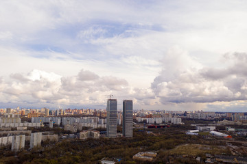 industrial views of a big city at sunset filmed from a drone