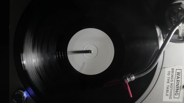 4K - DJ Turntable Record Spinning Around 