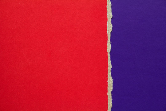 Red and purple blue torn cardboard paper texture background. Can be used for text message.