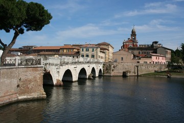 Fototapeta na wymiar River Marecchia with Tiberius Bridge, Rimini