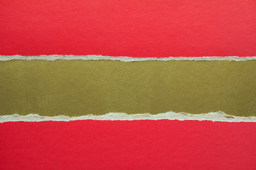 Red and golden torn and ripped sheet of cardboard paper texture background. Can be used for text...