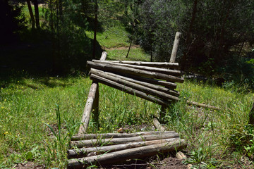 broken wooden ramp in the forest