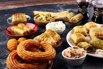 Middle eastern or arabic dishes. Turkish Dessert Baklava with pistachio. Halal food.