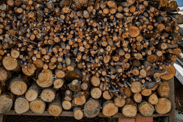 Stack of wood. Natural wooden textures. Timber background. Sawed woods details.
