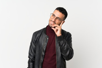 Young man over isolated white background with glasses