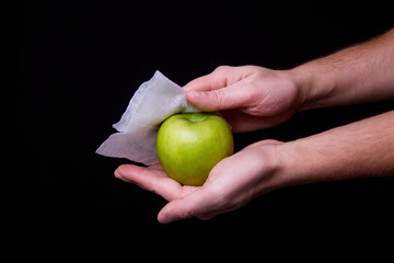 washing and cleaning the Apple with antiseptic products before use