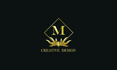 Elegant design of royal vector logo with letter M on black background. Stylish golden floral monogram for business, restaurant, boutique, cafe, hotel, labels and more.