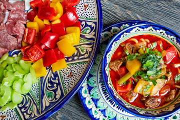 Soup with vegetables and meat and chopped foods