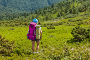 Fototapeta na wymiar Young people are hiking in Carpathian mountains