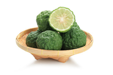 Bergamot in basket material of Essential Oils isolated on white background with clipping path.