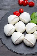 Tasty italian food, fresh white buffalo mozzarella soft cheese balls from Campania