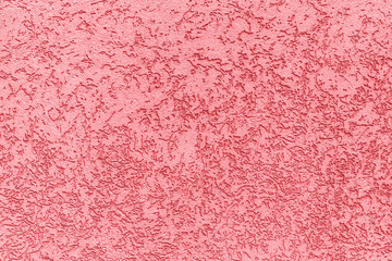 Rough pink wall texture background.