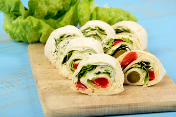 vegetables wrapped in tortillas and cut into small pieces