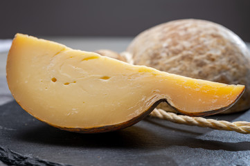 Italian semi hard matured caciocavallo cheese, handmade and aged in natural underground caves in Apulia region