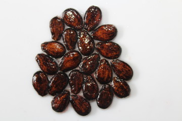 Watermelon seeds isolated on white background.Black ssed pattern.