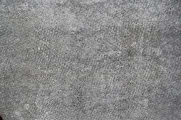 Grey background. Flat slate. Smooth rough surface