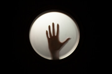 human hand in the window