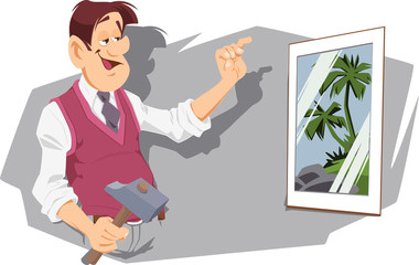 Happy man hung painting. Household chores.