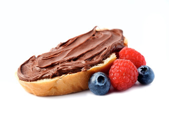 Toast with chocolate cream and berries