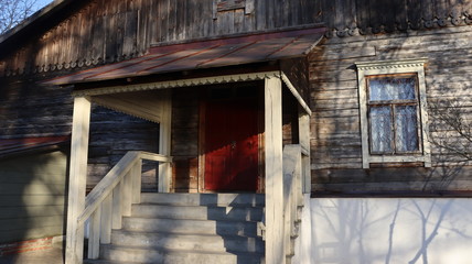 wooden verande entrance in russian style