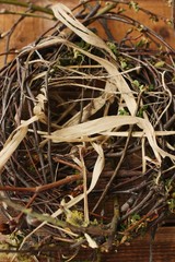 Homemade nest of branches and leaves macro 
