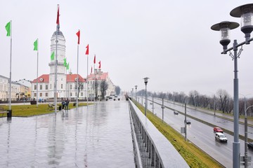 Fototapeta premium Mogilev, Belarus - March 2020. Beautiful old town in Mogilev city, Belarus. Town hall. Mogilev landmark, cultural heritage. City street with historical building.
