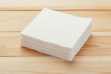 white paper napkin with a textured pattern on an old table