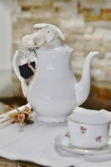 Teapot and cup with doll mouse