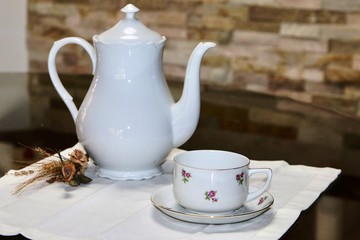 Teapot and flower pattern cup white
