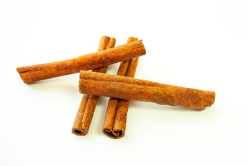 Cinnamon sticks on a white background