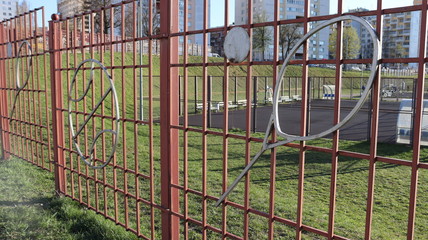 college stadium with dirty seats and symbols