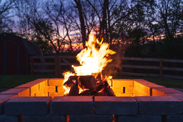 Relaxing campfire in the backyard fire pit.