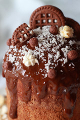 easter chocolate cake with popcorn, coconut and cookies