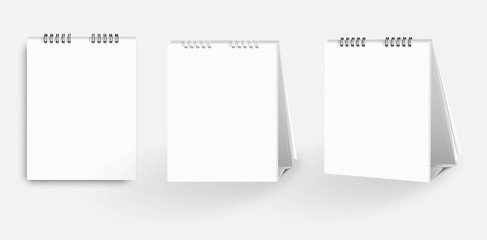 Fototapeta na wymiar White blank paper desk spiral calendar.
