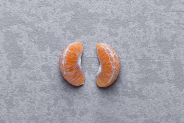 Fresh orange slices with nice textured background.
