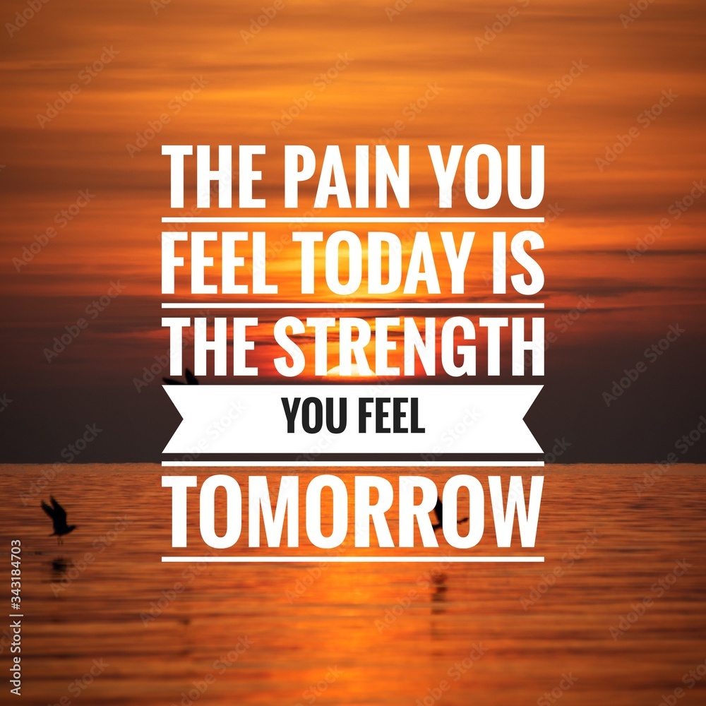 Wall mural motivational quote on sunset background - the pain you feel today is the strength you feel tomorrow.