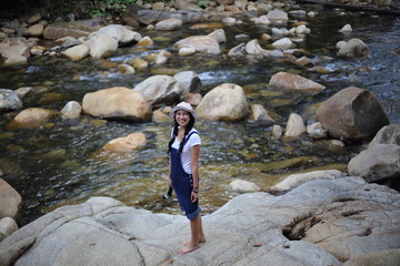 Women playing in fun at Khlong Phaibun Waterfall, Chanthaburi, Thailand